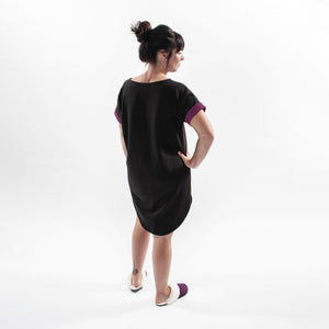 
            
                Load image into Gallery viewer, Women Wearing Plum and Black Bamboo Pajama Nightgown with Sheepskin Slippers
            
        