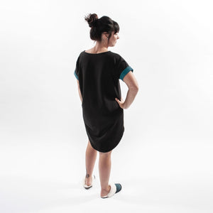 
            
                Load image into Gallery viewer, Women Wearing Aqua and Black Bamboo Pajama Nightgown with Sheepskin Slippers
            
        