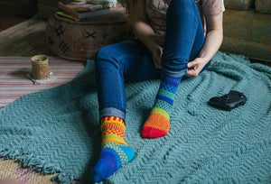 
            
                Load image into Gallery viewer, Person Wearing Rainbow Solmate Crew Socks
            
        